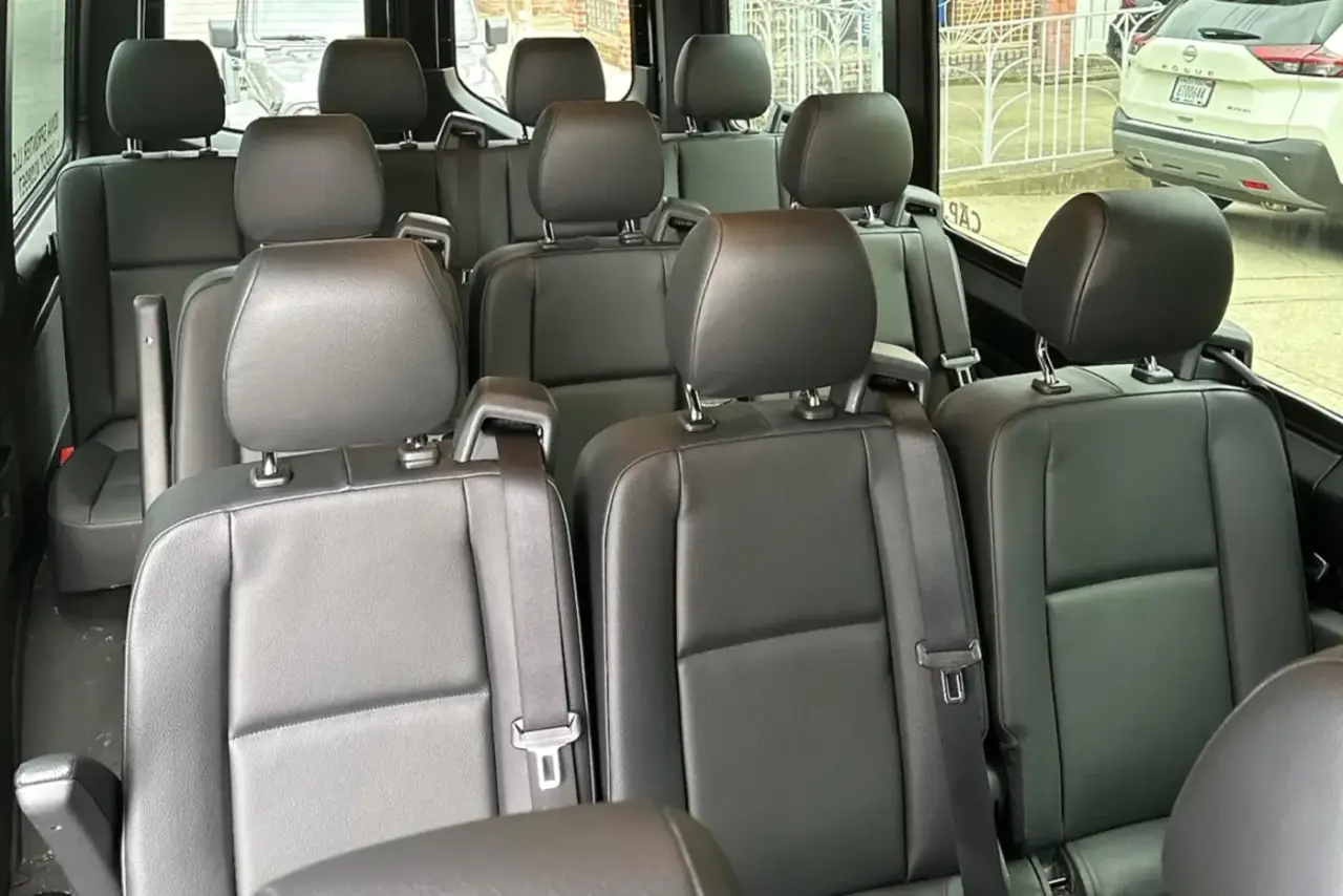 Interior seating of a private Sprinter van for airport groups in NYC