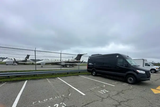 Sprinter van at a private aviation FBO for airport pickup