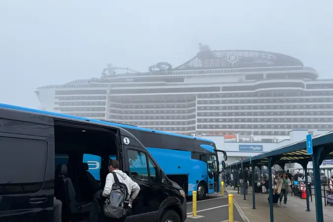 Passenger boarding a Sprinter van at Brooklyn Cruise Terminal