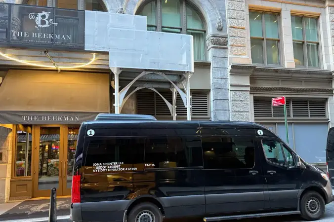 Sprinter van at a Manhattan hotel for airport dropoff and pickup
