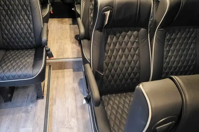 Premium quilted leather seats inside a Sprinter van